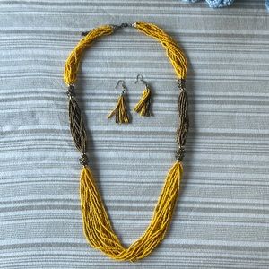 Yellow and gold beaded necklace with matching earrings
